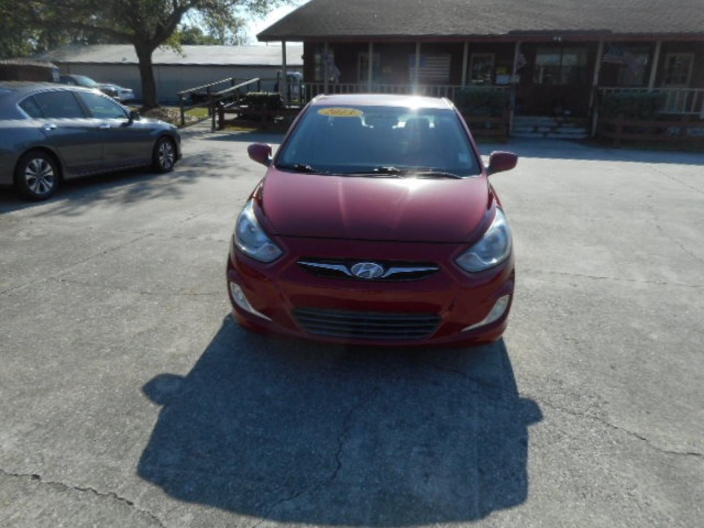 2013 RED HYUNDAI ACCENT GLS (KMHCU4AE9DU) , located at 1200 Cassat Avenue, Jacksonville, FL, 32205, (904) 695-1885, 30.302404, -81.731033 - Photo#0